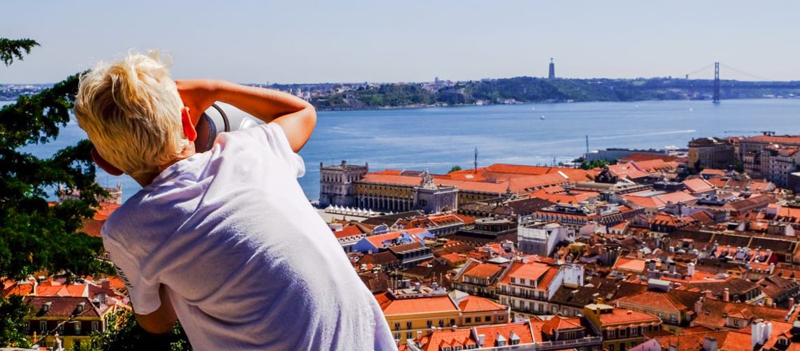 child-observes-the-view-Portugal