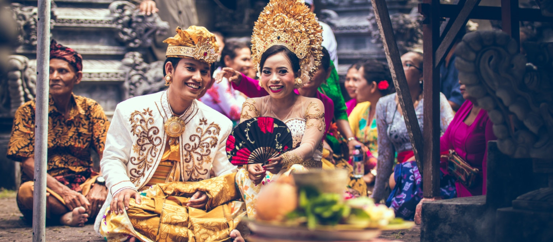 Couple during religious ceremony Bali Little Guest Hotels Collection