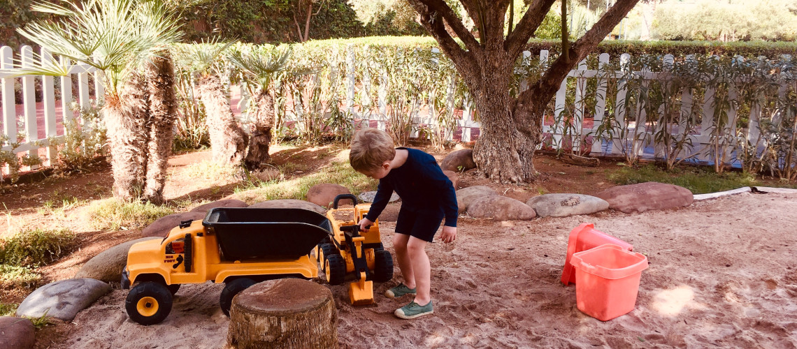 child-playing-in-the-sand