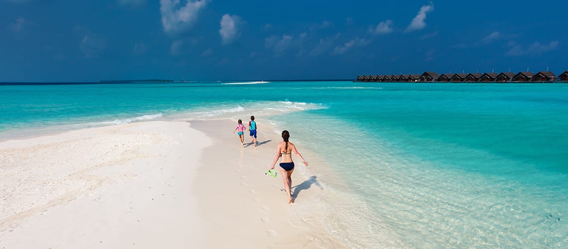 Maldives with family kids beach ocean