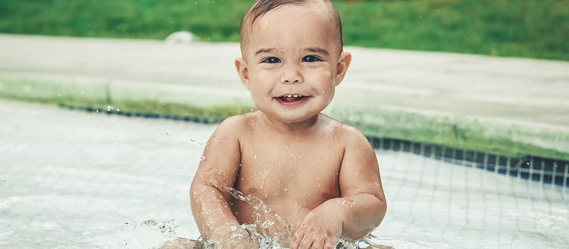 Baby-playing-in-the-pool