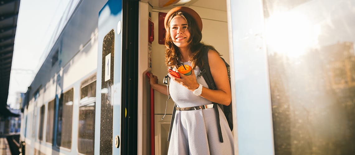 Young-woman-at-the-train-door