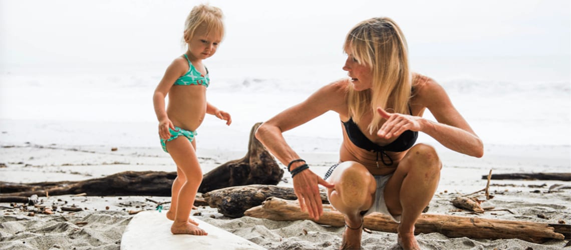 mother-and-daughter-on-a-surfboard