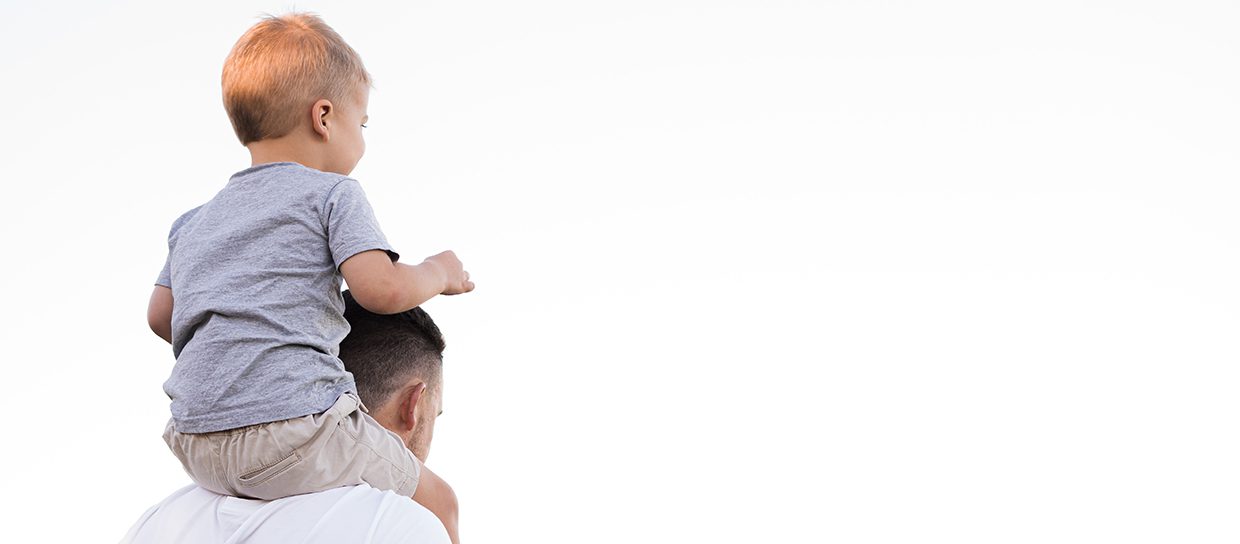 child-on-his-father-shoulders